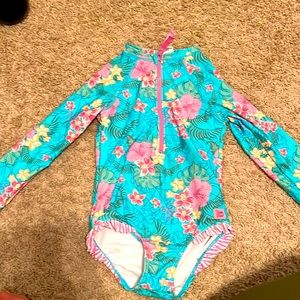Rufflebutts rash guard swim suit